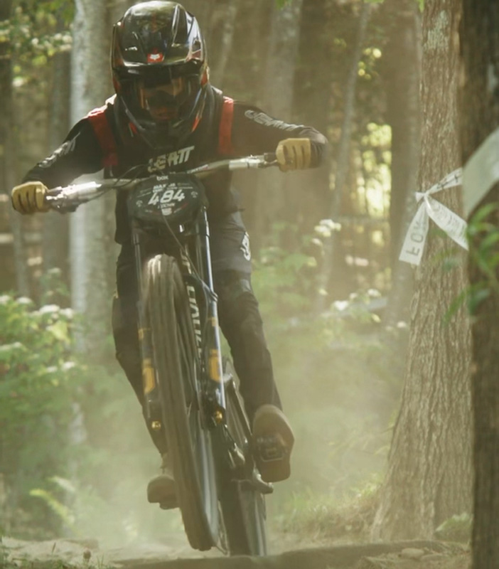 Vineyard mountain biker climbs to the top