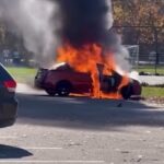 Nissan erupts into flames in school parking lot