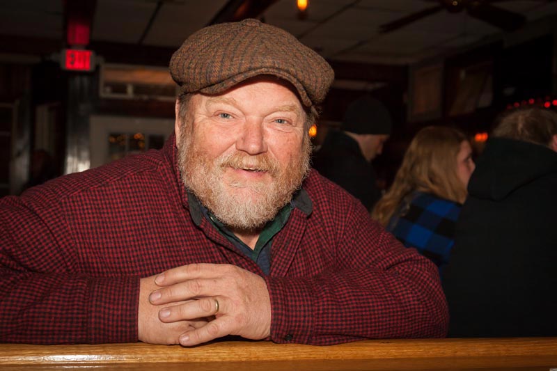 Big John of Oak Bluffs watches the game at the Ritz.