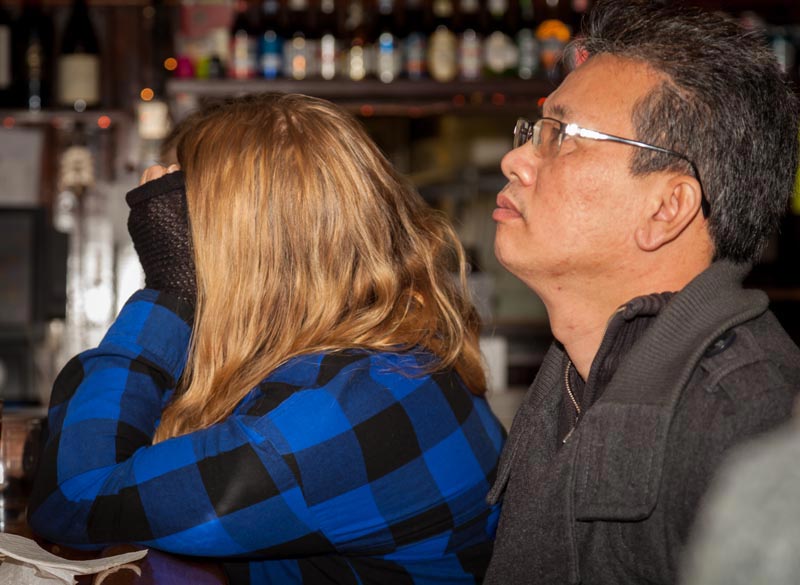Ritz customers react as The Atlanta Falcons score another touch down.