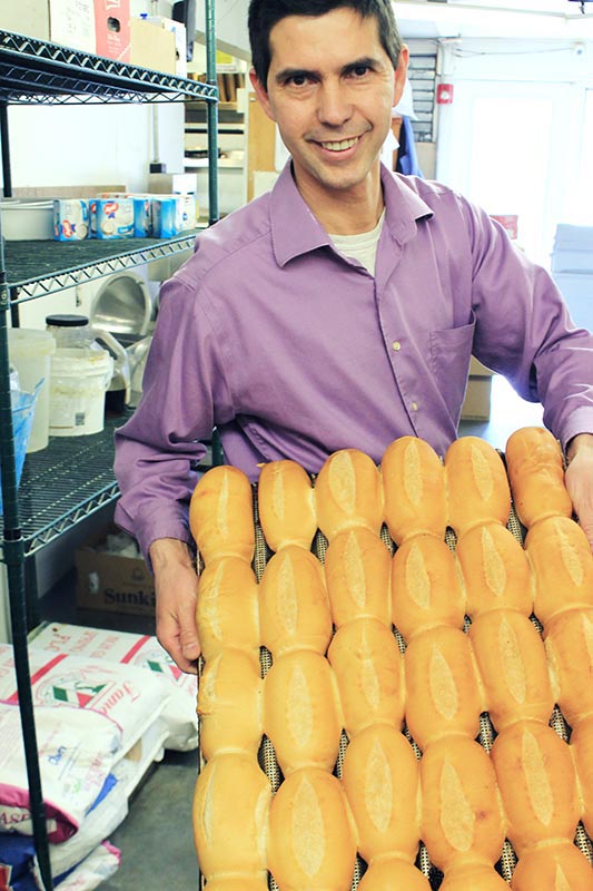 Elio and fresh baked bread.JPG