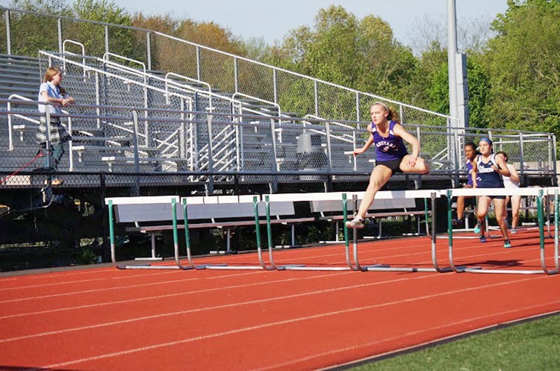 Livy Smith in the 100 meter high hurdles.