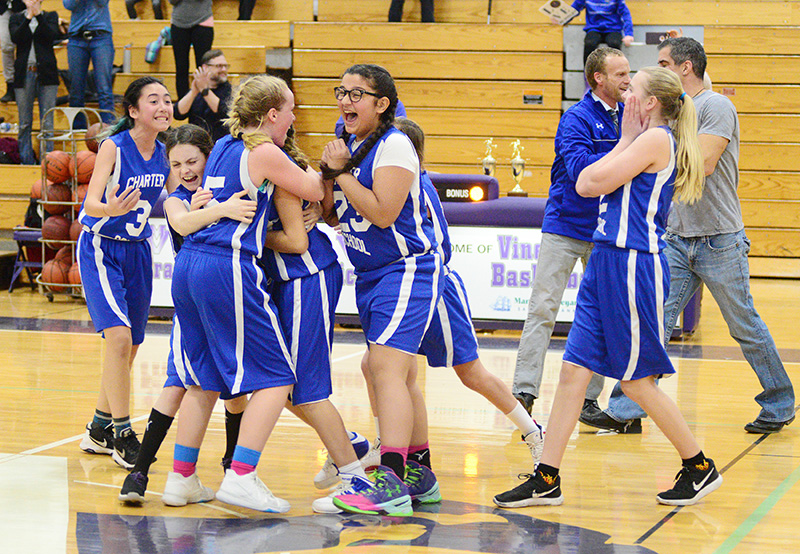 The Charter School girls celebrate their championship win.
