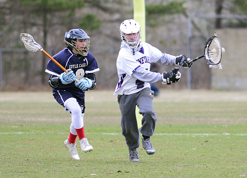 Vineyard goalie Max Smith goes for a run outside the crease.