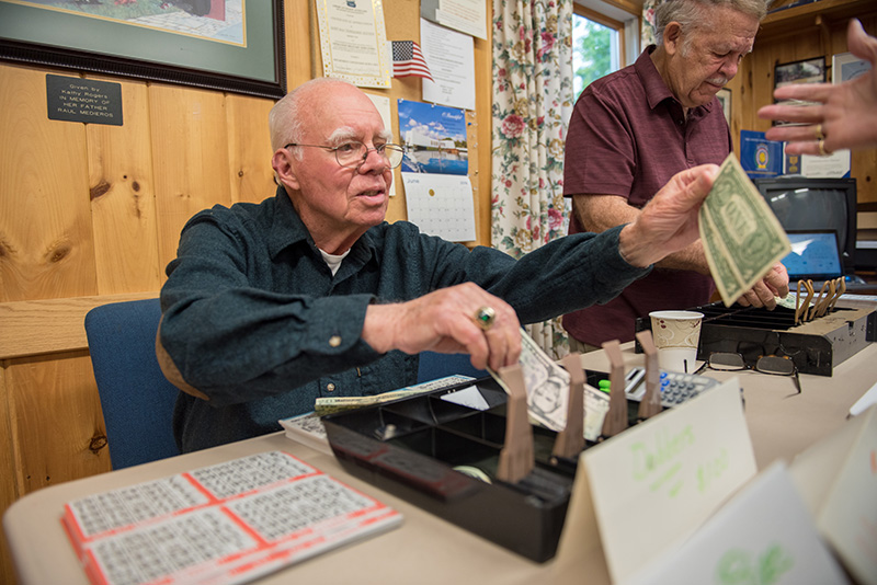 Bob Faulkenburg sells bingo sheets.