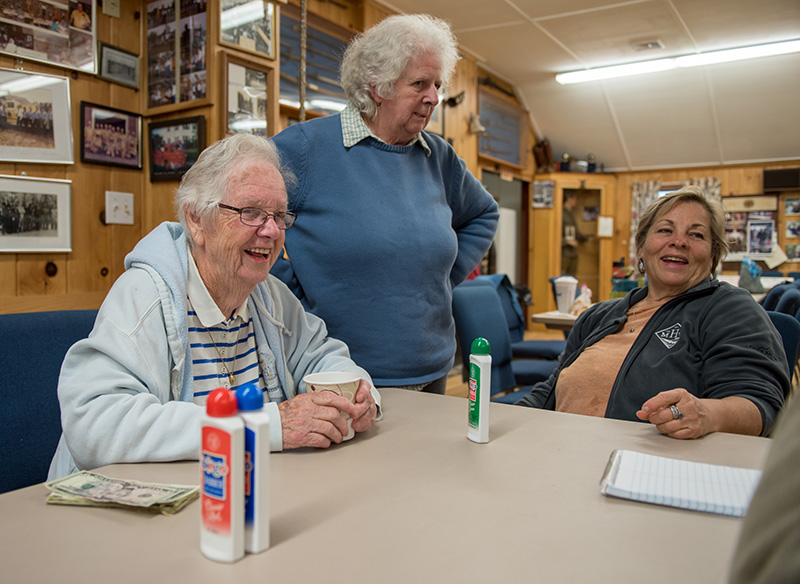 From left, Roberta Morgan, Silvia Olejarz and Judy Silvia talk before bingo.