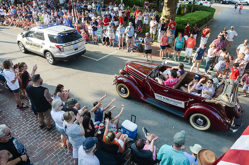 The final loop of the parade makes its way down Main Street.