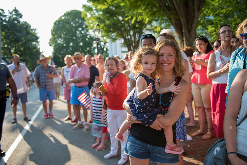 The crowd waits for the parade to make its way down Main Street.