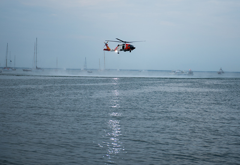 The helicopter arrives in Vineyard Haven, and hovers close to the harbor.