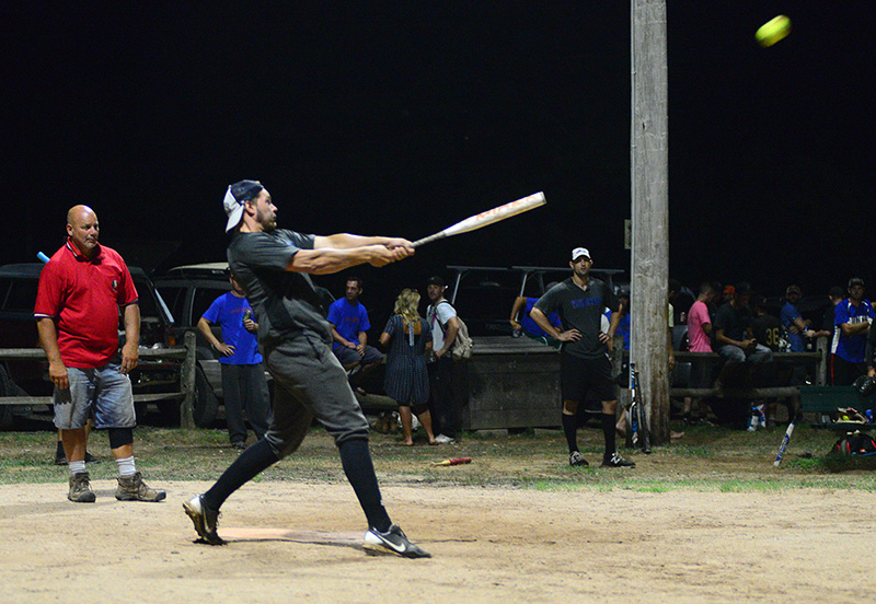 Evan Sosa of the Whitecaps launches a long double into the night.