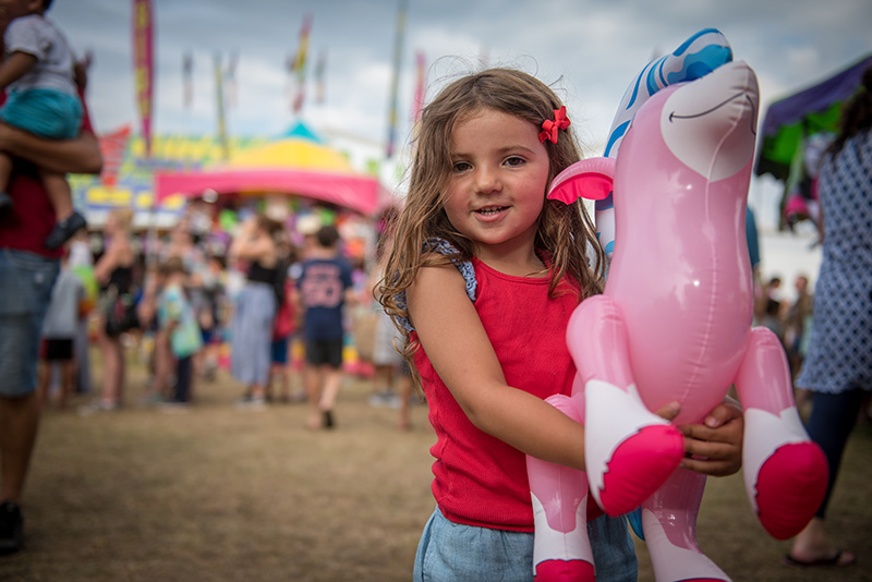 Maya Cray, 3, won a blow up pony in the duck pond game.