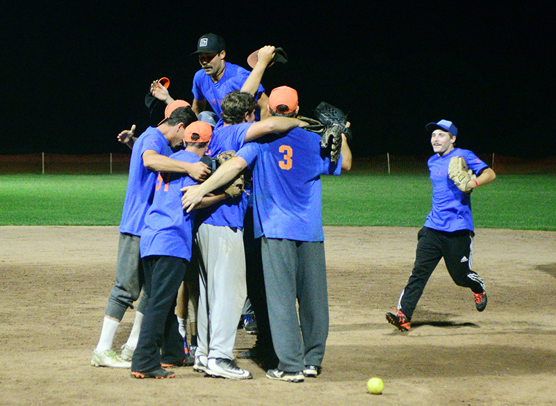 The Highlanders celebrate their championship after the final out.