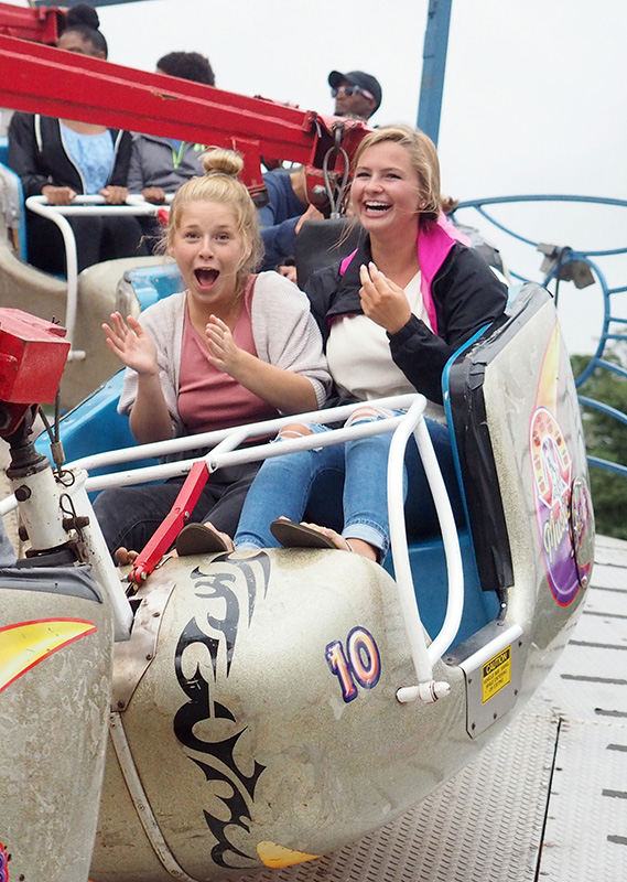 Stella Napior and Maggie Hobby having fun on the Music Fest ride.