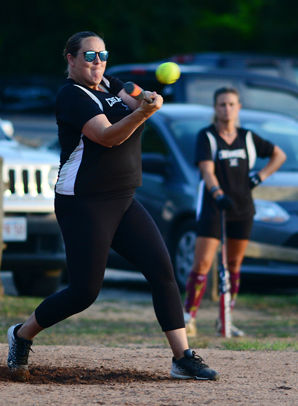 Tara Dinkel makes contact for the Creamers.