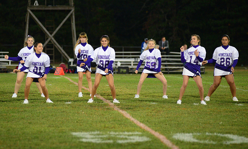The Vineyard junior high cheerleaders perform at halftime.