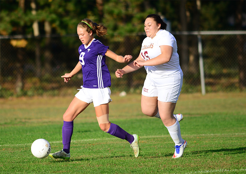 Madia Bellebuono stays one step ahead of a Cape Cod Tech defender.