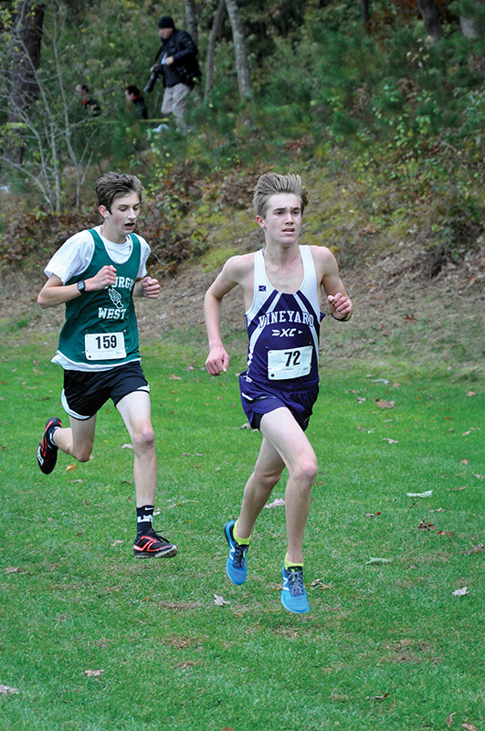 Junior Peter Burke, right, leads Sturgis West winner .25 miles from the finish.