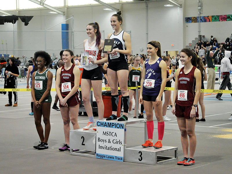 Mackenzie Condon (second from right) was third in the high hurdles final.