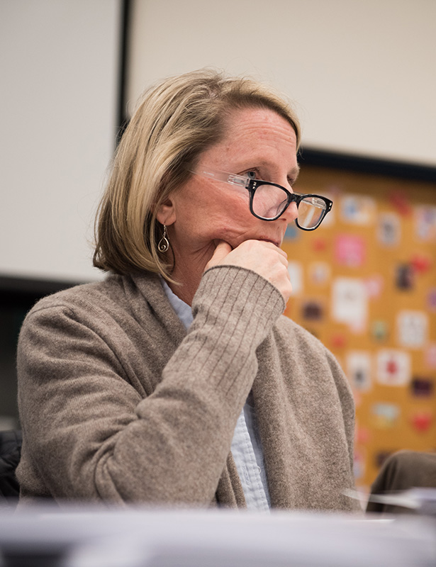 School committee chair Kris O’Brien listens to public comments.