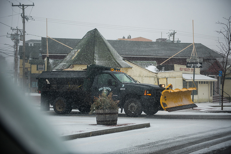 Snow plows patrol the streets during the snow storm.