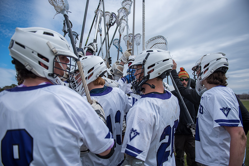 The Vineyarders break after a timeout in the second quarter.