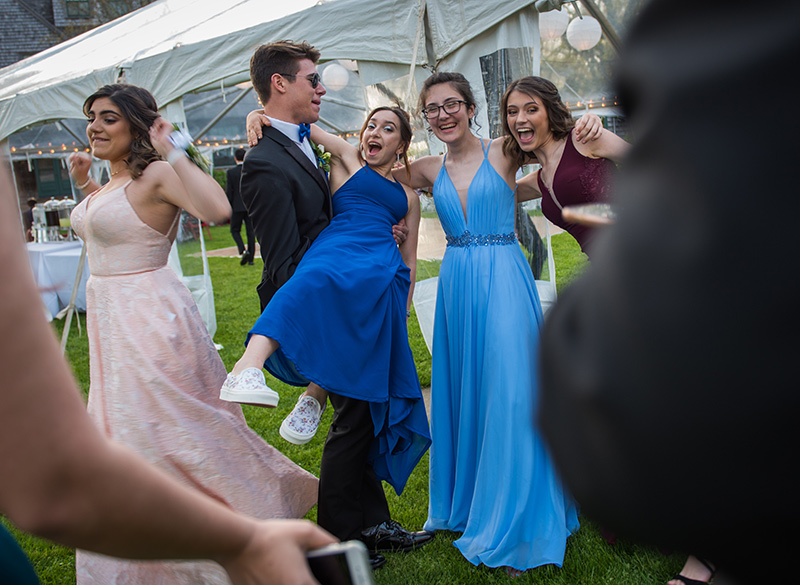 MVRHS students take photos while at prom at the West Chop Club.