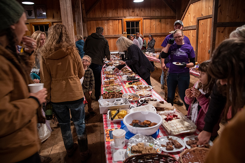 Sweet treats and hungry people lined the tables.