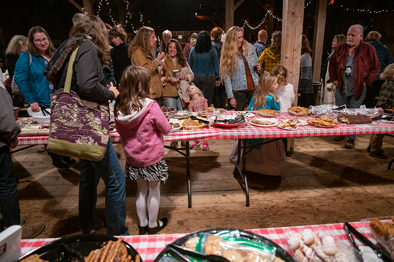 Sweet treats and hungry people lined the tables.