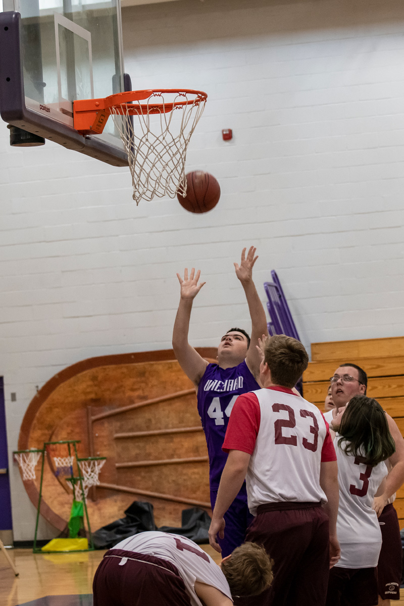 Michael Johnson shoots a basket.