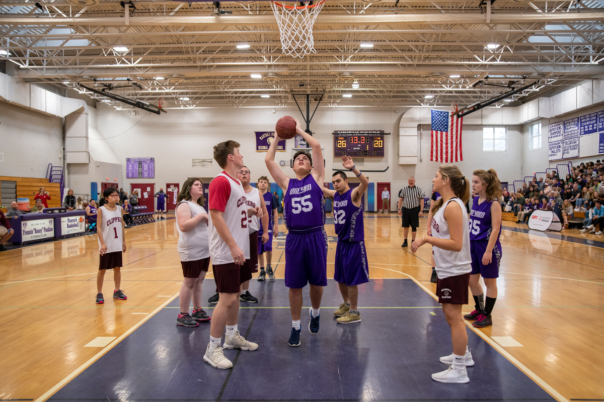 Michael Johnson goes to shoot a basket.