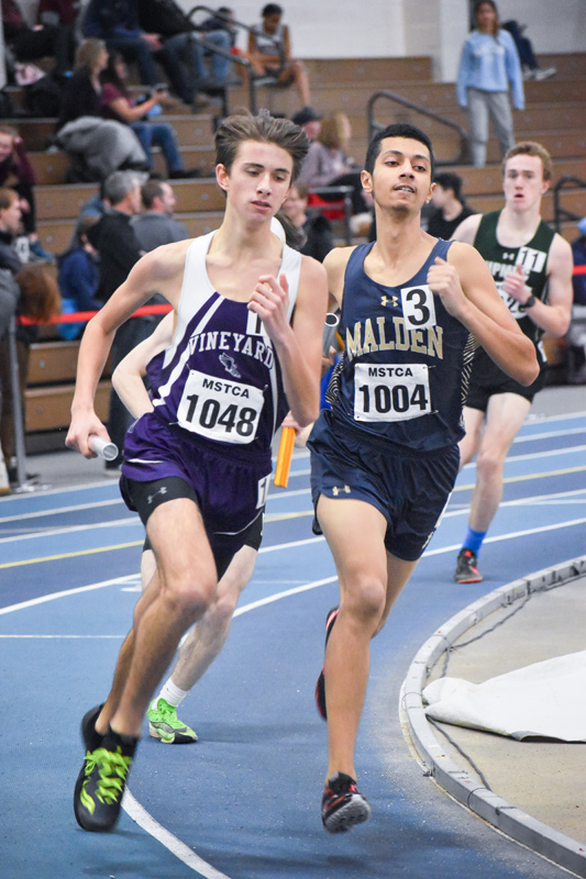 Zach Utz sprints ahead in the relay.