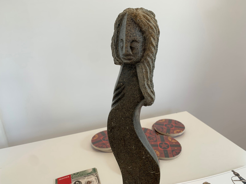 serpentine-woman-doll-statue.jpg