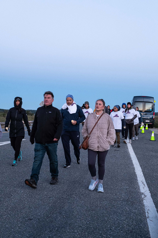 Participants walked into the morning light together.