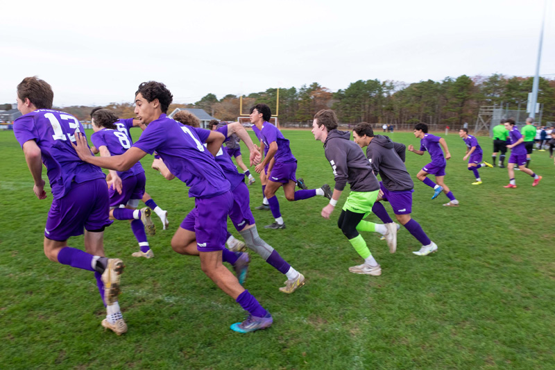 Boys-Varsity-Soccer_team-running.jpg