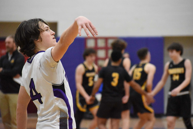 Junior guard Nate Story watches his shot during a halftime shootaround.