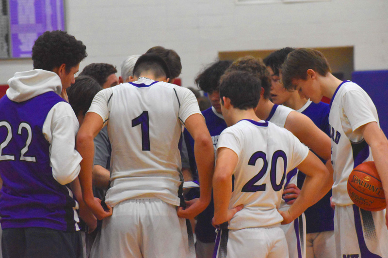 The Vineyard huddle against Nauset.