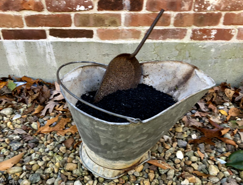 Soot from wood burning adds carbon to compost.