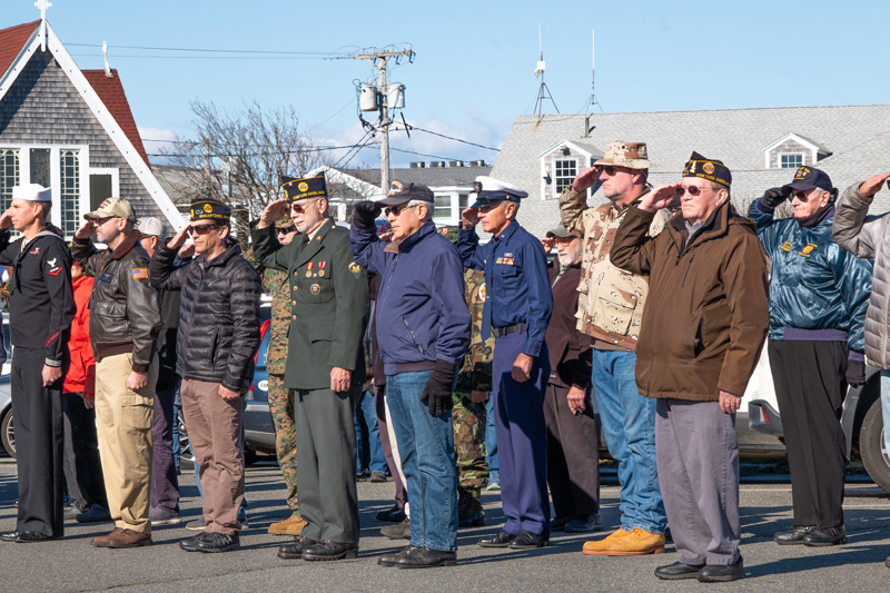 Those who processed in the parade stood at attention during the ceremony.