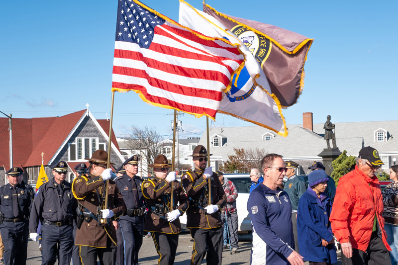 Sheriffs proudly held flags high during the parade march.