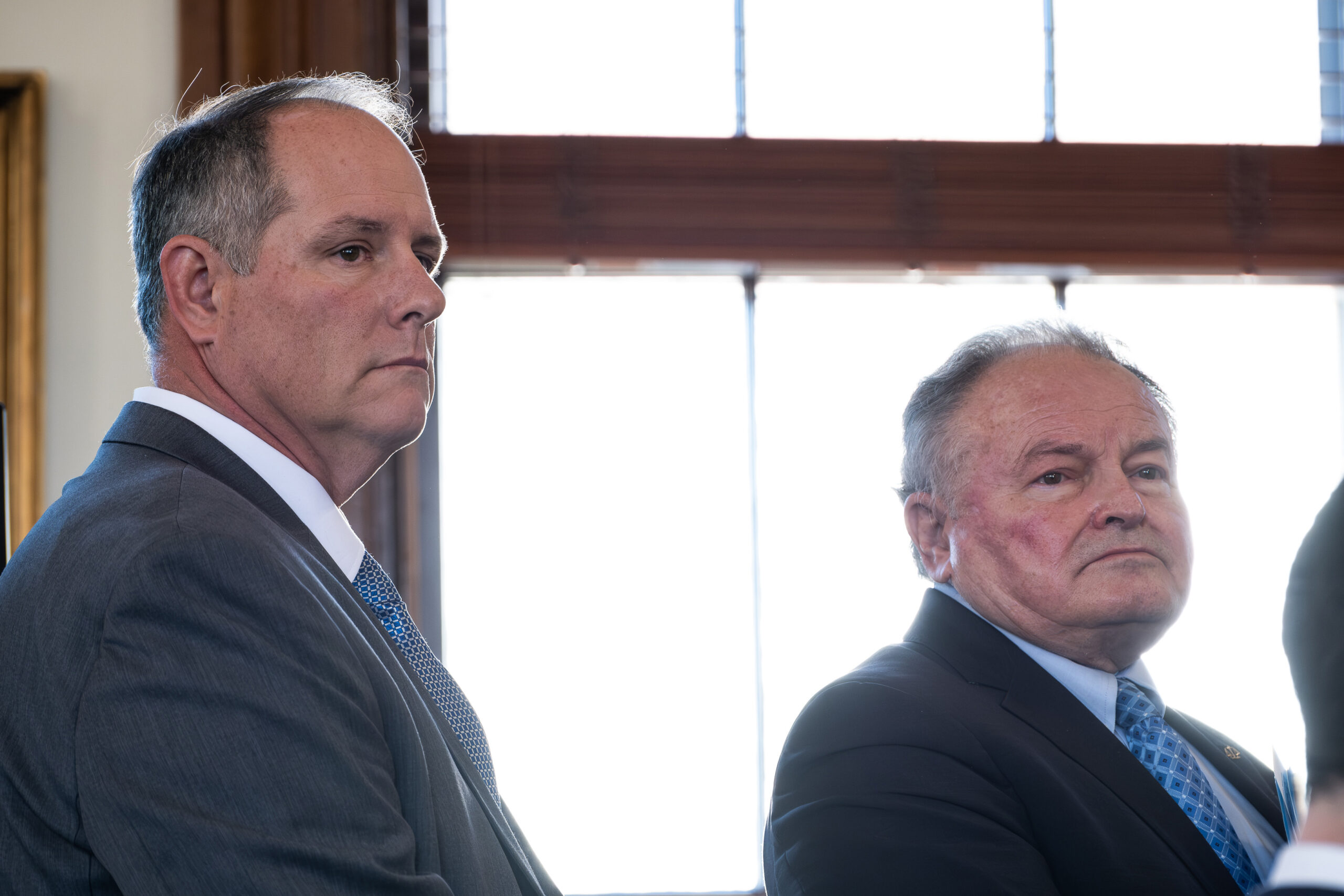 John Rose and his lawyer, Mark Miliotis.