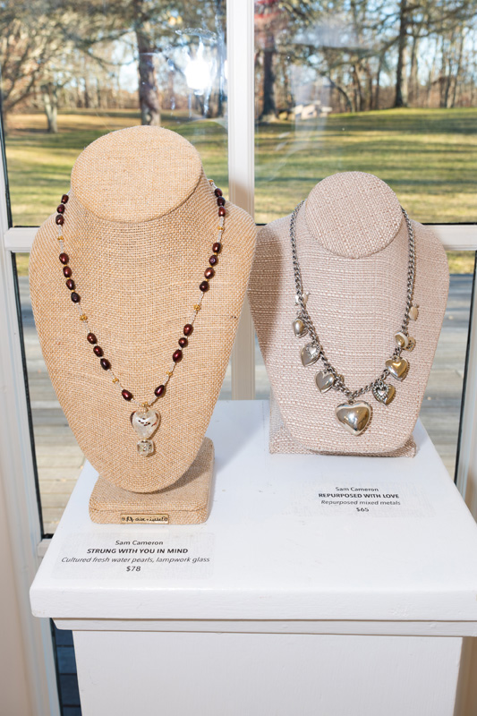 Sam Cameron’s heart adorned necklaces.