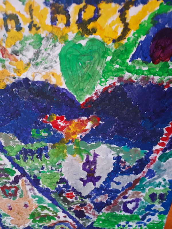 “Kindness,” group painting art by some of Miss Lani’s students..