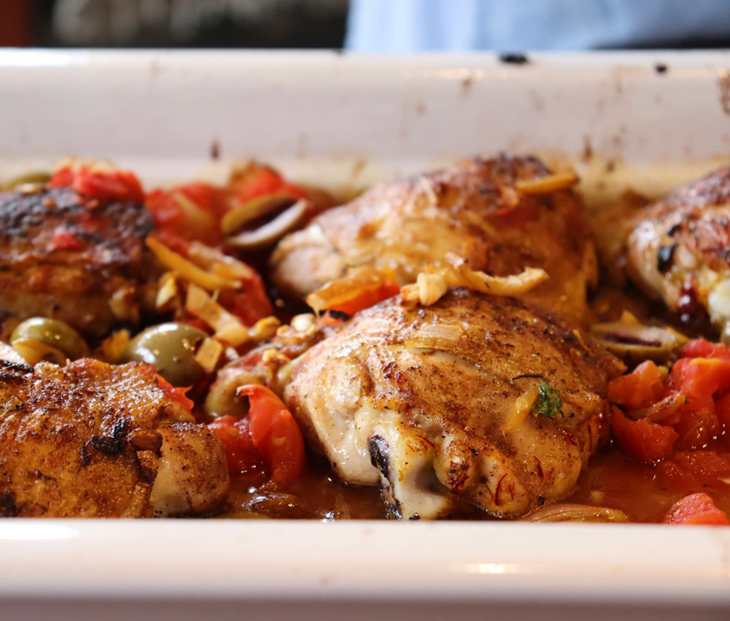 #7_4_25_Cal_in the kitchen with Jan_upclose Moroccan chicken.jpg