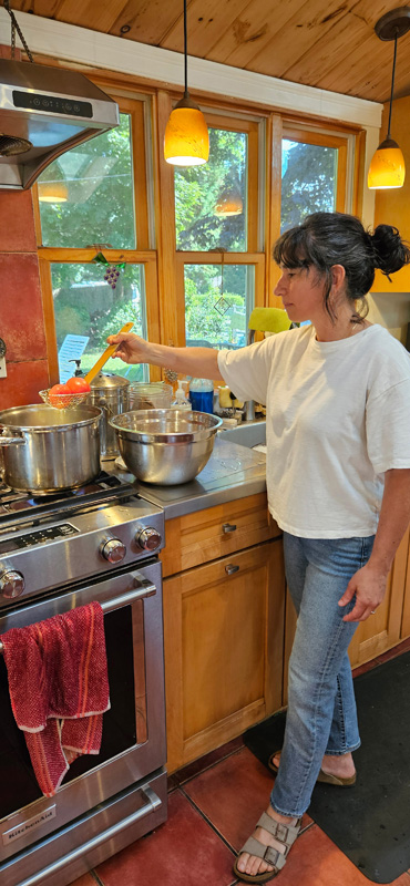 Gina Patti removing tomatoes from water