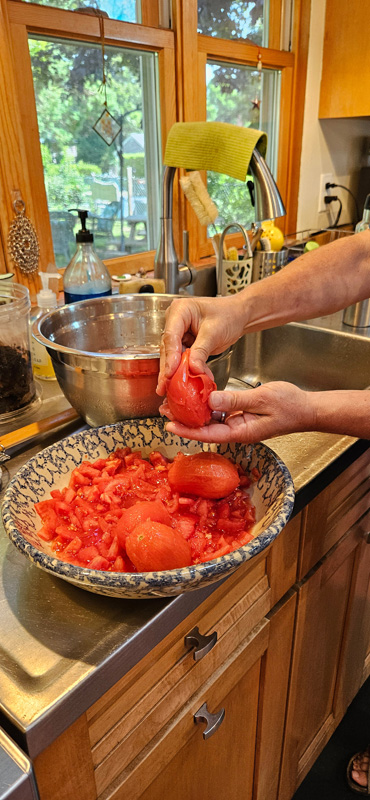 Patti removing tomato skins