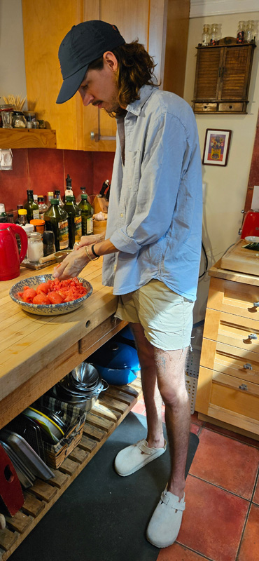 Scott Bradley chopping tomatoes