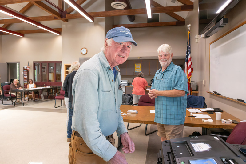Matthew Stackpole cast his ballot as Constable John Powers looked on.