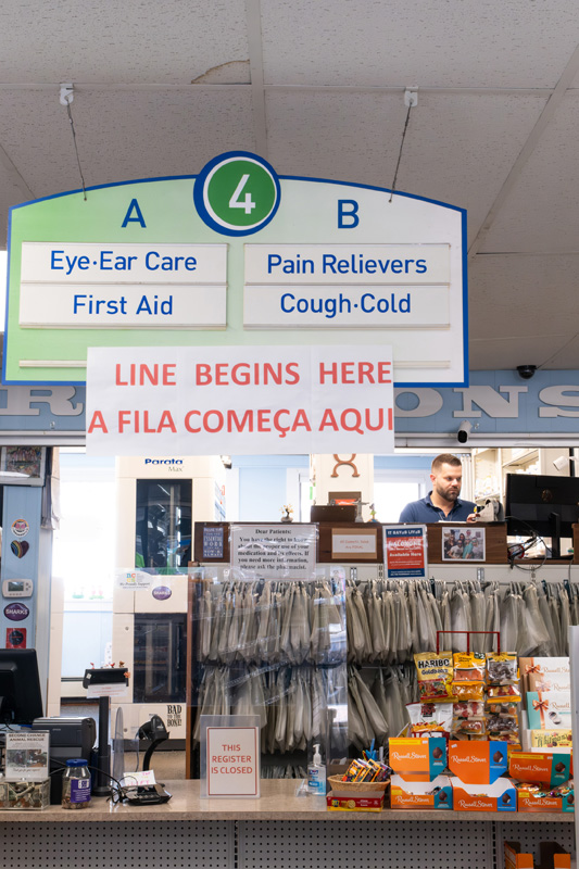 Pharmacy Technician David Holmberg at his workstation at Leslie’s Pharmacy.