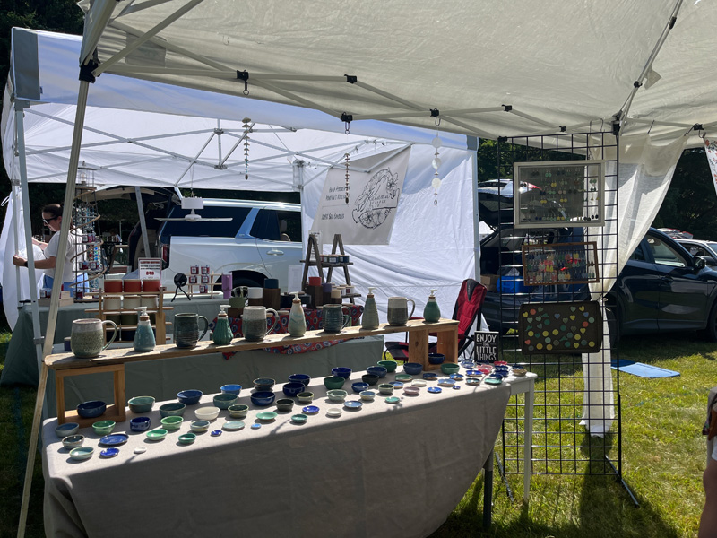 Opening day of the Chilmark Flea Market .