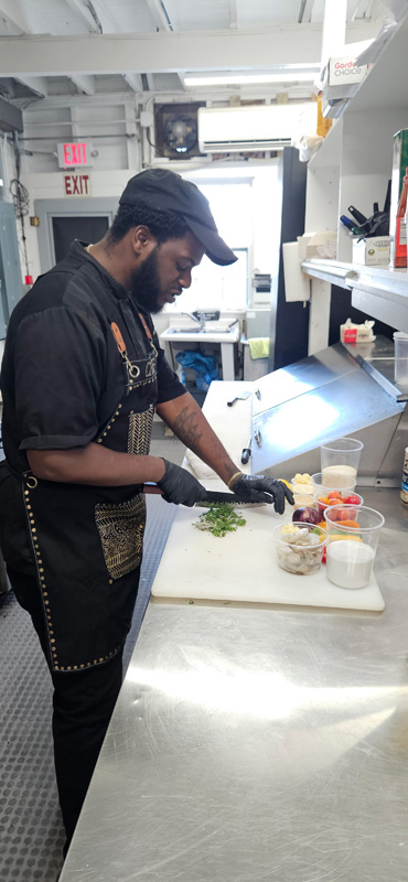 Chef John chopping herbs at the speed of light